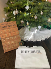Load image into Gallery viewer, Do It With Love Sweatshirt Always Crewneck on the floor next to Christmas countdown and tree.
